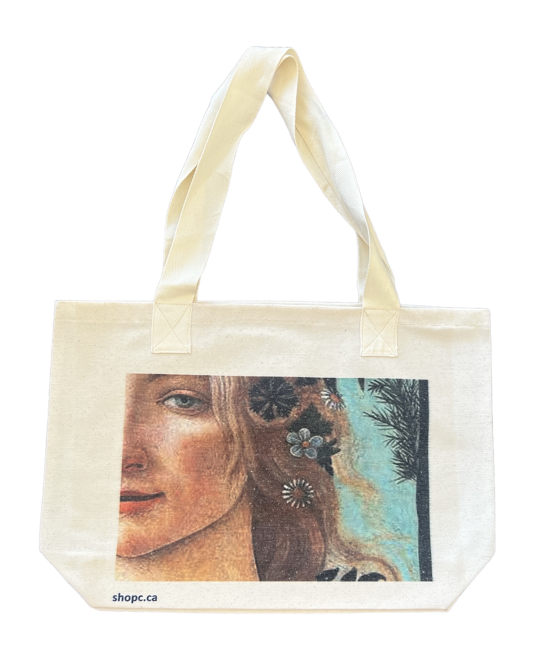 Canvas tote bag with a close-up of Flora’s face from Botticelli’s Primavera painting, showing her floral crown and calm, serene expression.